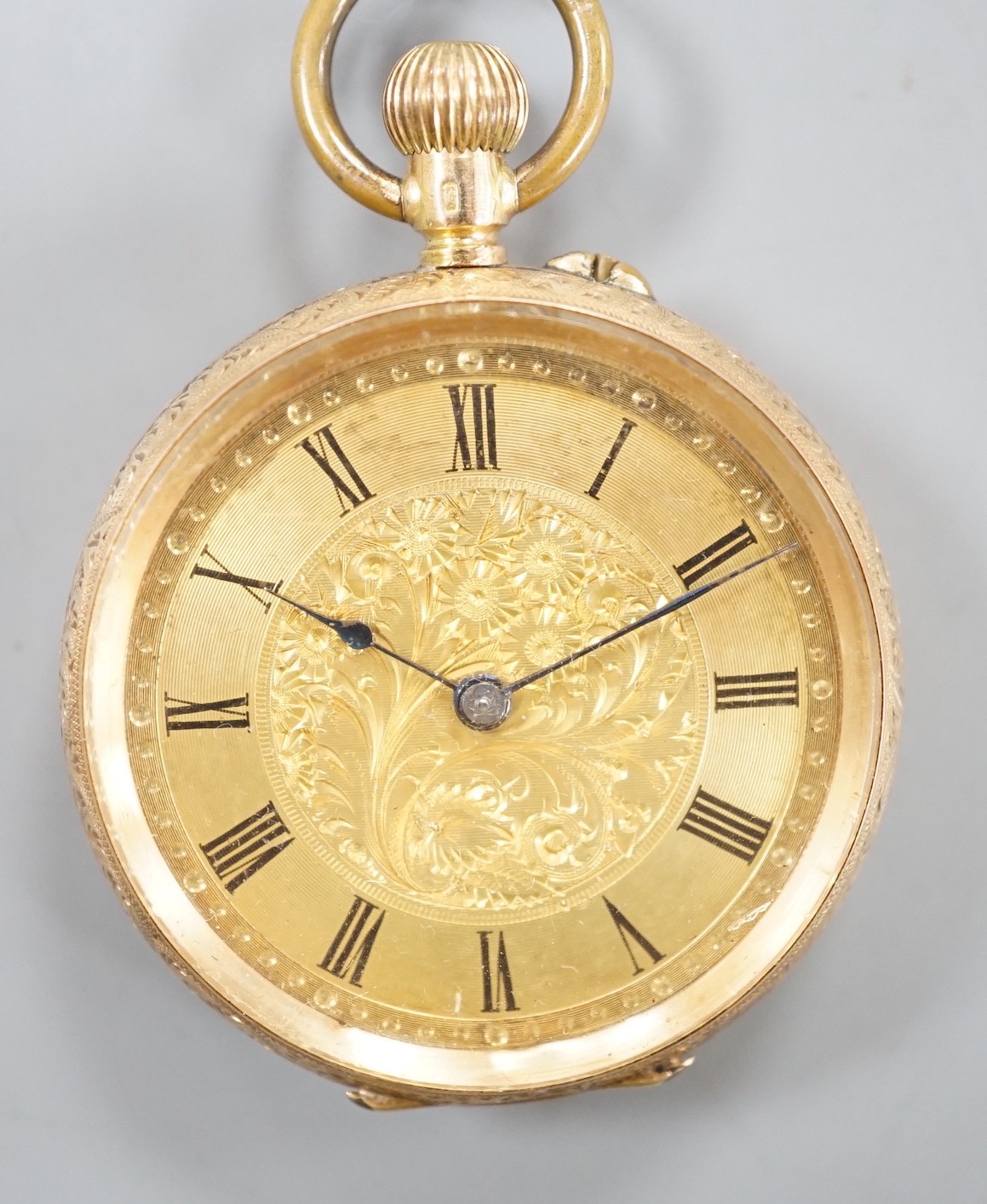 An engraved 14k open face fob watch, with Roman dial, 37m, gross weight 38.7 grams.